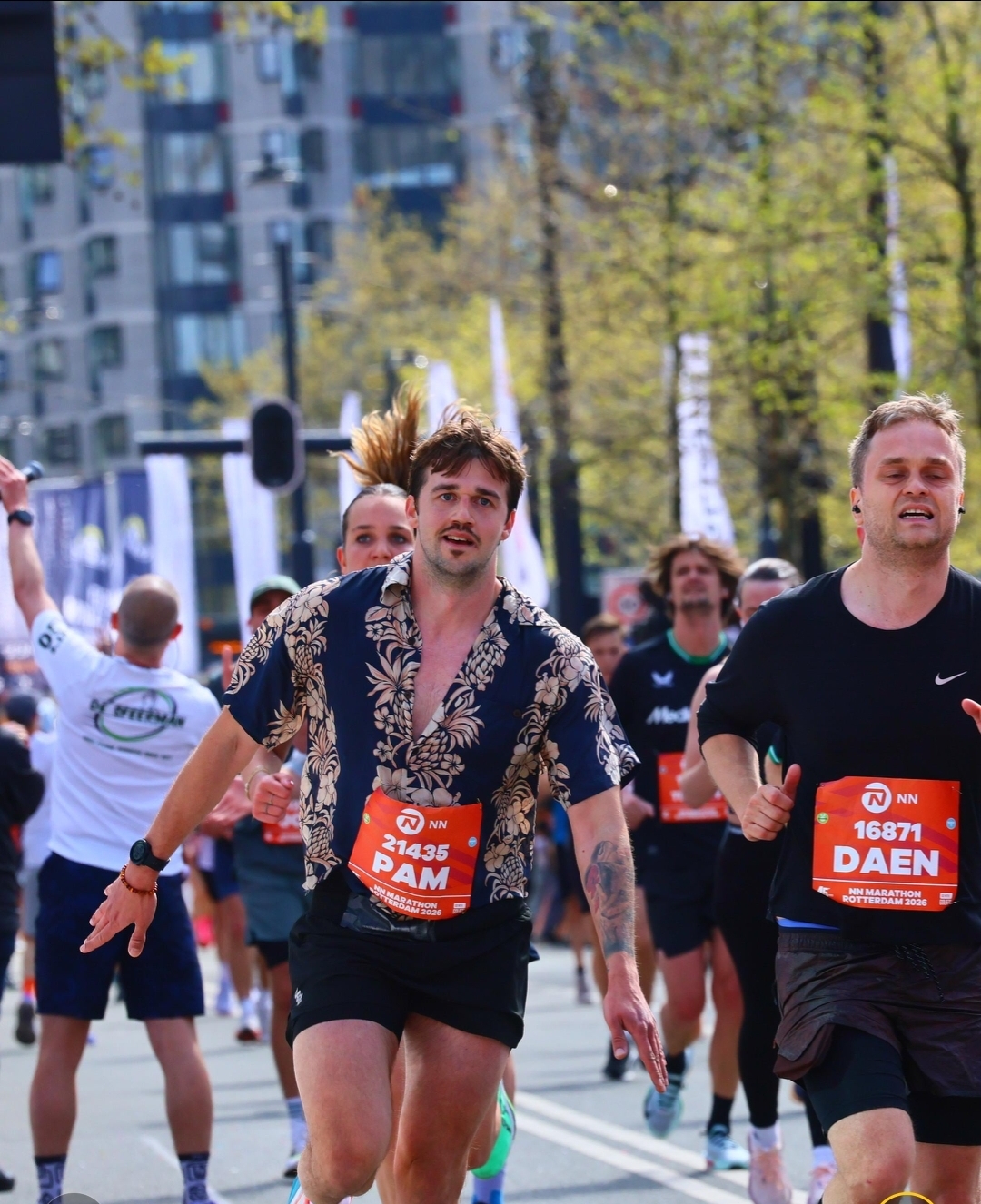 Greg smiling mid-stride during the Rotterdam marathon